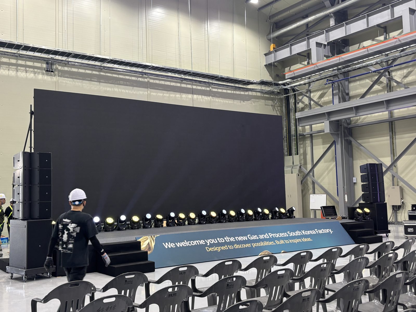 The same structure, screen on — factory opening ceremony 2026